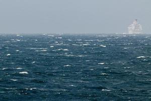 Ship in the tempest in north sea photo