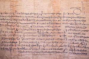 ancient arabic writings on papyrus photo