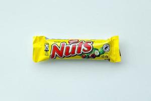 KYIV, UKRAINE - MAY 4, 2022 Nuts original chocolate bar manufactured by Nestle company photo