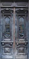 Old ancient wooden door texture in european medieval style photo