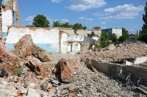 Collapsed industrial multistorey building in daytime photo