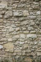 Texture of stone wall with many big brown stones photo