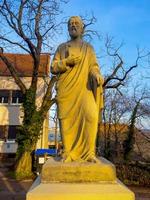 Nitra, Slovakia -01.29.2023Statue of the Apostle Simon in the historic center of the city. photo