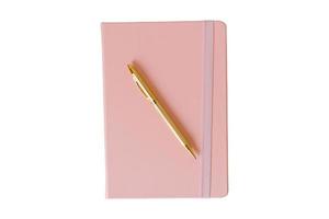 4071 Pink notebook and gold pen isolated on a transparent background photo