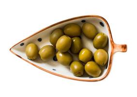 2653 Green olives in a bowl isolated on a transparent background photo