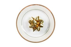 6503 Beige plate with gold ribbon isolated on a transparent background photo