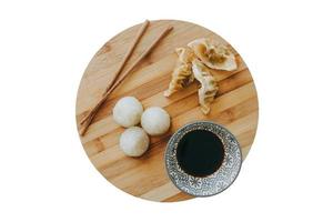 1833 Wooden tray with japanese food and soja isolated on a transparent background photo