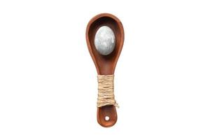 3992 Brown spoon and quail egg isolated on a transparent background photo