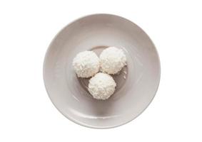 1990 Gray plate with coconuts balls isolated on a transparent background photo