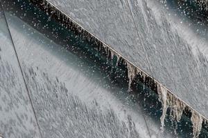 heavy rain on roof detail photo