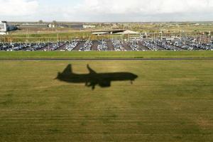 airplane silhouette while landing photo