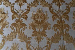 medieval fabric texture background gold and white photo