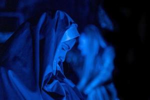 Virgin Mary model blue in the black photo