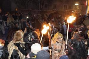 NEUSCHOENAU, GERMANY - JANUARY 5 2019 - Lousnacht night celebration with forest spirit Waldgeister in Bavaria village photo