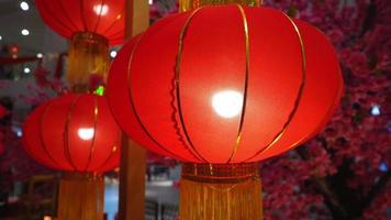 Tracking view illuminated red Chinese lantern decoration video