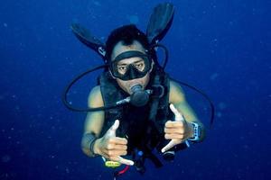 Scuba diver underwater portrait in the ocean photo