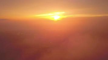 Fly over cloud toward during misty evening. video