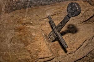 real sword in the rock in san galgano tuscany photo