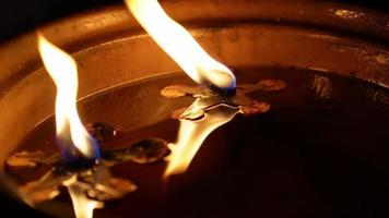 Close up the oil lamp in night video