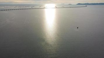 Drone hyperlapse move forward to Penang Second Bridge in evening hour video