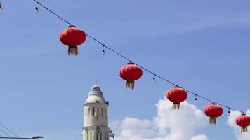 Red Chinese lantern at the background of mosque video