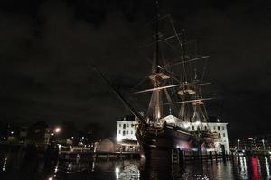 amsterdam canal vessel ship museum at night photo