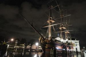 amsterdam canal vessel ship museum at night photo