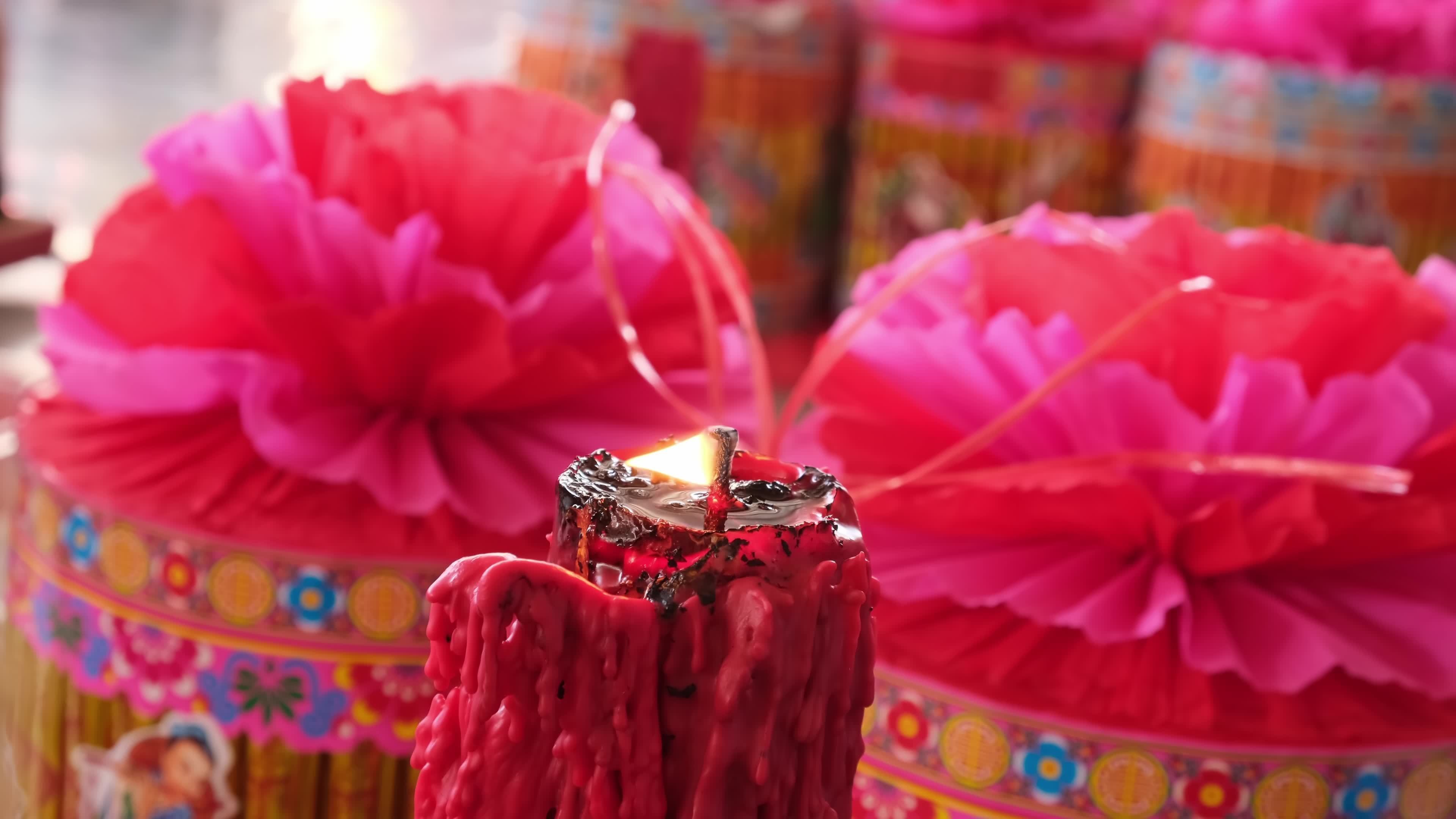 Large candle burn with background of joss paper offering 20226854 Stock