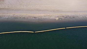 Aerial view barrier at sea video