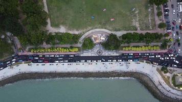 Aerial descending and view the people walk at new seawall video