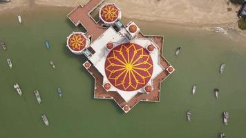 Aerial ascending top down view floating mosque video