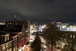 amsterdam central station at night cityscape photo