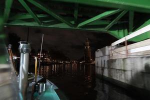 amsterdam canals cruise at night photo