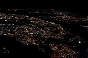lisbon aerial night cityscape from airplane while landing photo