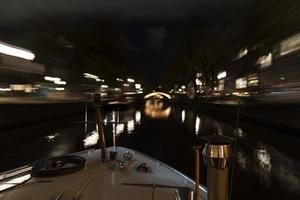 amsterdam canals cruise at night photo