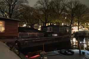 amsterdam canals cruise at night photo