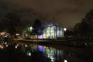 amsterdam canals cruise at night photo