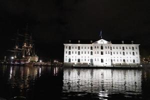 amsterdam canal vessel ship museum at night photo