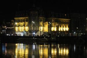 amsterdam canal at night view photo