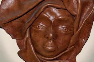 African woman leather mask photo