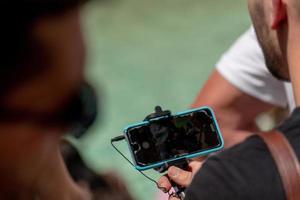 Selfie with smartphone at Trevi Fountain crowded of tourists Rome Italy photo