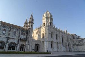 lisbon jeronimos monastery at sunset photo