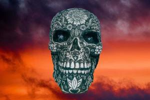 mexican dead skull isolated on inferno background photo