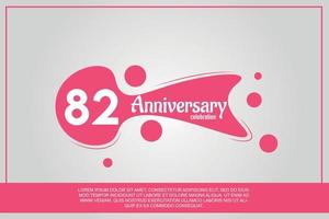 82 year anniversary celebration logo with pink color design with pink color bubbles on gray background vector abstract illustration