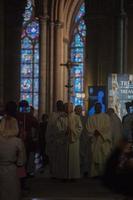 PARIS, FRANCE - MAY 1, 2016 - Notre Dame Cathedral crowded for sunday mass photo