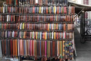 leather belts in italian market for sale photo
