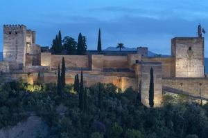Alhambra fortress palace in Granada Spain at sunset photo