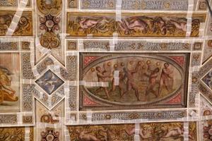 FERRARA, ITALY - SEPTEMBER 29 2018 - Medieval paintings in Estense Castle in Ferrara Italy under restoration photo