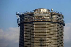 old gas tank silo metal building photo