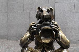 NEW YORK, USA - MAY 5 2019 -  Dog and bunny photographer statue photo